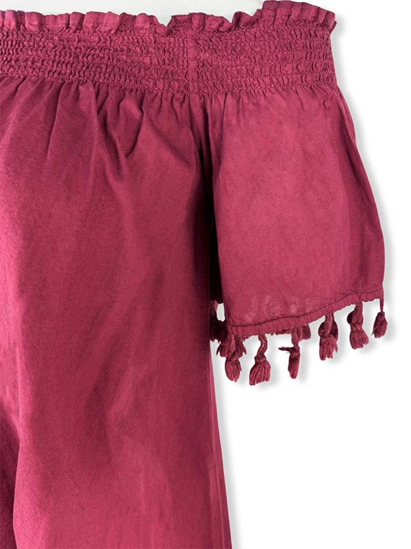 abito-spalle-scoperte-in-mussola-unita-con-frange