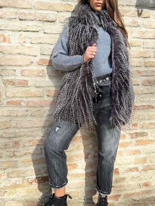 Jeans relaxed con rotture